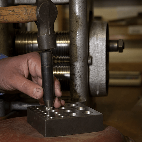 A ring under the loupe on the bench at Wharton Goldsmith